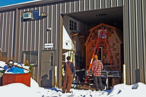 Our tiny house is safe and sound inside the builders' garage.
